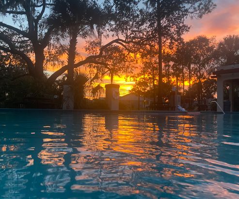 Sunset at the deserted community pool